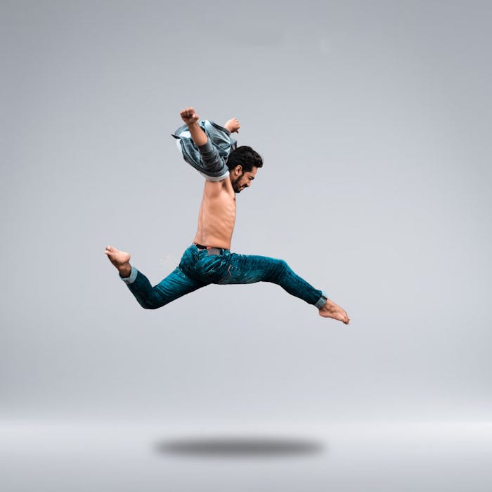 Man Jumping High While Posing